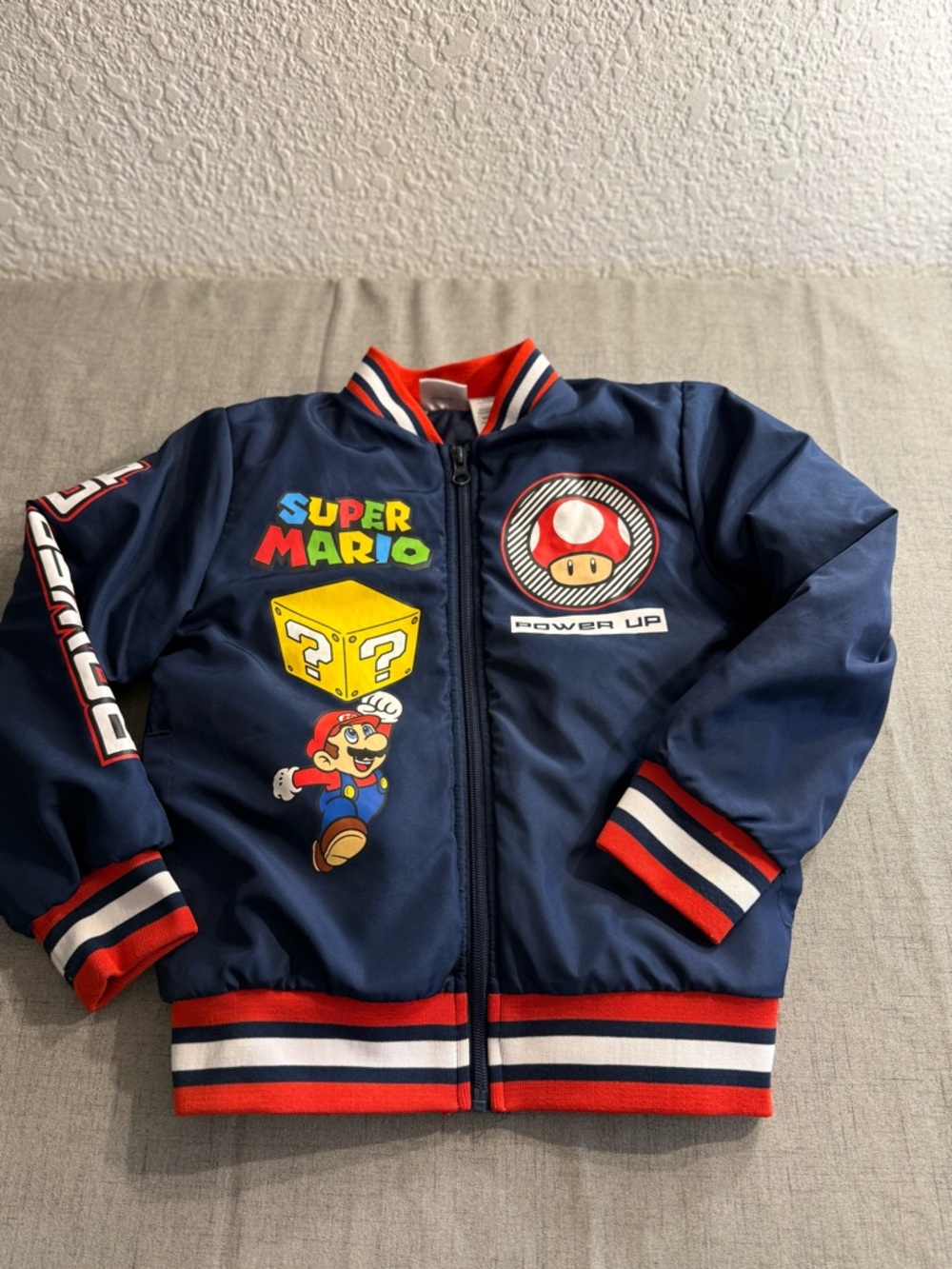 Super Mario Power Up Boys Admiral Navy Bomber Varsity Jacket Size 6/7.